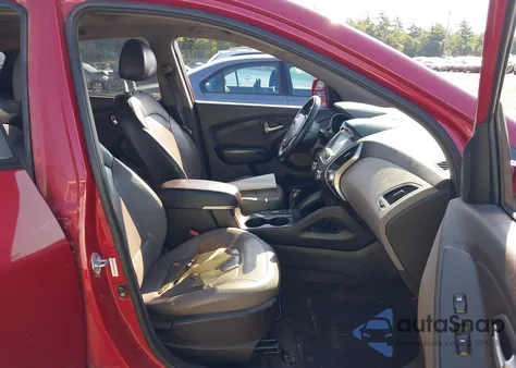 2012 Hyundai Tucson Limited из США, поврежденный, VIN KM8JUCACXCU545263